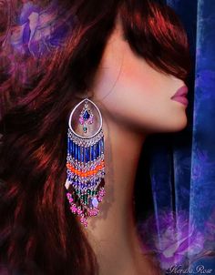 "This pair of Exotic Colorful Beaded Boho Chandelier Earrings is made with Cobalt Blue, Bright Orange, Violet, Hot Pink and Emerald Green glass beads and plated metals. The hoop frames a decorated blue crystal teardrop bead. The beaded strands flare out into metal dangle charms and pink glass beads. Available with Posts, Clip-Ons or French Wires. -6\" Long x 1 1/2\" Wide -0.5 oz. ea. -Free shipping! (Domestic) If you like this design you may also like these: https://www.etsy.com/listing/47566421 Purple Bohemian Chandelier Earrings For Party, Bohemian Purple Chandelier Earrings For Party, Blue Bohemian Hoop Earrings For Party, Bohemian Blue Hoop Earrings For Party, Multicolor Beaded Chandelier Earrings For Festive Occasions, Colorful Dangling Beads Earrings For Party, Colorful Beaded Dangling Earrings For Party, Bohemian Teardrop Chandelier Earrings For Party, Bohemian Hoop Earrings With Dangling Beads For Party