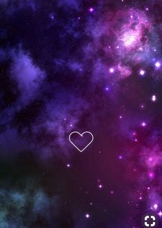 an image of a heart in the middle of space with stars and clouds behind it