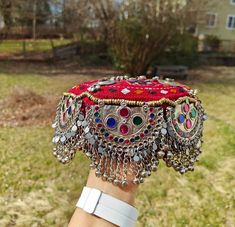 Handmade Afghan Halima Sultan Cap Head Jewelry Mathapatti ALERT!! Heavy Cap, heavily embellished A beautiful handmade afghan head jewelry is here. The afghan artisans residing in Pakistan make these beautiful caps. These are beautiful and one of a kind. There are vintage embellishments attached and beautiful hangings attached to the front. The cap covers the forehead, but it varies from person to person. This goes well with traditional afghan dresses and jewelry.  In addition, these can be perfe Afghan Jewelry Head Piece, Afghani Suit, Afghan Hat, Vintage Embellishments, Afghani Jewelry, Halima Sultan, Afghan Women, Pakistani Culture, Afghani Clothes