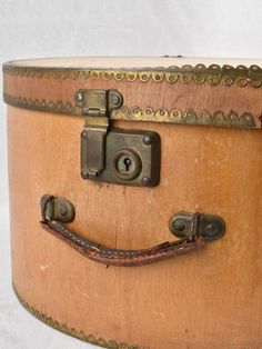 This superb hat box dates from the 1900s. It is made from beechwood with leather handles and pretty brass capping. The shape is referred to as a 'sunset' hat box. No key so it can't be opened therefore decorative use only. Condition and wear consistent with age and use.Approx. overall 8" high x 17¼" x 18½" Approx. overall 20cm high x 44cm x 47cm Vintage Hat Boxes, French Hat, Victorian Hats, Vintage Trunks, Hat Boxes, Hat Box, Cute Hats, Leather Handles, Hats Vintage