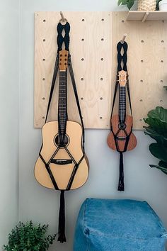 **Please note that all sales are final.** This one of a kind macrame ukulele hanger is the best way to not only store your ukulele but display it in style. Customize the color of your hanger with many different color options to perfectly match any décor in your home! **Contents** * 100% recycled cotton * All natural wooden ring **Care/Import** * Hand wash * Handmade in the USA **Dimensions** * Size Small - 48” Fits a Soprano (20” tall) Concert (24” tall) and Tenor (26” tall) Ukulele * Size Large Macrame Guitar Hanger, Macrame Ukulele Hanger, Ukulele Sizes, Ukulele Hanger, Macrame Designs, Triangle Jewelry, Custom Hangers, Guitar Hanger, I Would Rather