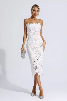 The Jazlyn White Floral Lace Midi Dress is the perfect finishing touch to any outfit. Its lace fabric and midi length create a classic and timeless look, while the strapless design makes it ideal for any special occasion. Enjoy a sophisticated, feminine finish all night long. Simply complete the look with heels.Dress Length: Approx 96cmMaterials: PolyesterGentle Dry Clean OnlyThe model is 5 ft 74 and wears size SColor may vary due to lighting on images. The product images (without a model) are Elegant Strapless Lace Dress, Elegant Strapless Dress With Lace Trim For Summer, Spring Strapless Lace Wedding Dress, Spring Wedding Lace Dress, Strapless, Spring Wedding Strapless Lace Dress, Elegant Fitted Strapless Dress With Lace Trim, Chic Spring Strapless Lace Dress, Chic Strapless Lace Dress For Spring, Summer Strapless Lace Midi Dress