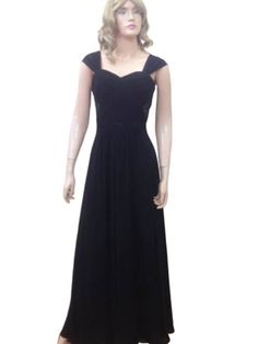 a mannequin wearing a black dress with short sleeves