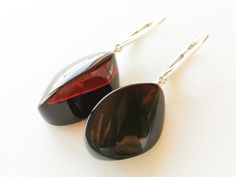 Small dark red amber earrings with silver sparkly burgundy | Etsy Modern Amber Earrings For Formal Events, Modern Baltic Amber Jewelry For Formal Occasions, Modern Amber Earrings For Formal Occasions, Modern Amber Earrings As A Gift, Modern Formal Baltic Amber Jewelry, Modern Amber Earrings For Gift, Elegant Amber Oval Earrings, Elegant Handmade Baltic Amber Earrings, Handmade Elegant Baltic Amber Earrings