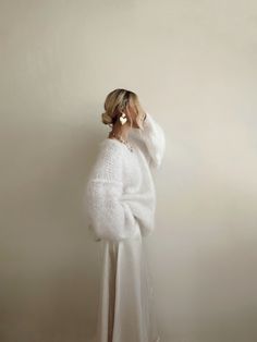 #handknit #handknitted #bridal #bridalwear #etsygifts #etsyfinds #pinterestfashion #minimalist #minimal #sweater #whitesweater Elegant Knit Sweater With Soft Texture, Elegant Oversized White Sweater, Cozy Mohair Sweater In Winter White, Elegant Mohair Crew Neck Sweater, Cozy Winter White Mohair Sweater, Oversized White Soft Sweater, Winter Wedding Mohair Sweater, Elegant Mohair Winter Sweater, White Mohair Chunky Knit Sweater