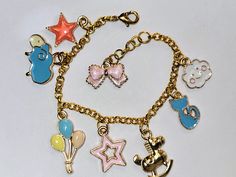 Charms are colorful and any child would love it - Gold tone chain, charms and components Jewelry Safe, Purple Earrings, Keep Jewelry, Copper Earrings, Adjustable Bracelet, Antique Copper, Chain Link Bracelet, Chain Styles, Link Bracelets