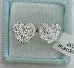 Beautiful Heart Diamond Stud Earrings White Gold. Excellent craftsmanship, the diamonds are very sparkling. Very pretty heart shaped earrings. Sits nice and flat on the ear. The diamonds are set close together, no gaps between the diamonds. The backings have two notches for a secure fit. These diamond earrings are simply classy and beautiful. Heart measures about 10.2 x 11.1mm. These earrings are nice size, not too big or small. Give the gift of love with these stunning earrings. Genuine natural Vvs Clarity Diamond Earrings For Valentine's Day, Valentine's Day Round Diamond Earrings With Vvs Clarity, Valentine's Day Vvs Clarity Diamond Round Earrings, Heart-shaped Diamond Earrings With Vvs Clarity For Gift, Diamond Heart Earrings With Vvs Clarity As Gift, Luxury Heart-shaped Brilliant Cut Earrings, Heart Cut Diamond Earrings With Accents For Valentine's Day, Luxury Brilliant Cut Heart Earrings For Valentine's Day, Luxury Heart Cut Diamond Earrings For Gift