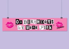 a pink sign with the words on birthdays we wear pink in black and white