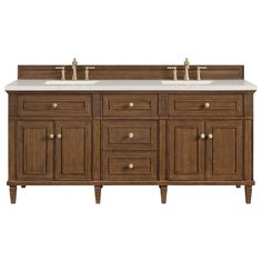 a double sink vanity with two sinks and wooden cabinetry on the top, against a white background