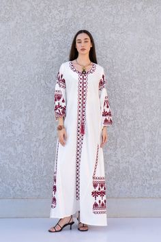 "**Note : The kaftan in the video is a different color of the exact same Kaftan and is only displayed to show the fit, flow, and cut of the Kaftan. You will receive the one in the pictures.** This bohemian embroidered dress is a an eye catcher! It is an extremely comfortable wear, light and soft and can be used on many occasions -  home gatherings, festival parties, summer occasions, dinners, or just in your home to feel comfortable.  Fabric : 70% Egyptian Cotton; 30% Polyester. Small (Size 4/6 Wedding Embroidered Maxi Length Kaftan, Embroidered Maxi Length Wedding Kaftan, Floral Embroidery Wedding Kaftan Maxi Length, Bohemian Floor-length Dress With Embroidered Border, Embroidered Floor-length Kaftan For Festive Occasions, Embroidered Floor-length Festive Kaftan, Long Embroidered Gown For Eid, Festive Embroidered Floor-length Kaftan, Festive Maxi Length Kaftan With Floral Embroidery