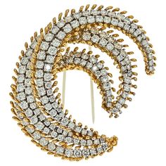 David Webb diamond and gold brooch crafted in 18k gold and platinum in a swirl Crescent motiff. This lovely brooch is set with round cut diamonds of approx. 12 carats. Brooch measures 2.25 inches. Designer Brooch, Iconic Jewelry, David Webb, Yellow Jewelry, Diamond Birthstone, Gold Dragon, Gold Brooch, The David, Diamond Brooch