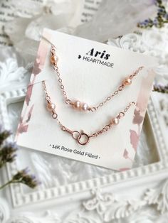 💗 Rose Gold Pearl Bracelet with pink freshwater pearls & 14K Rose Gold Filled 💗 ✨ Dainty & Elegant. Simply beautiful bridal bracelet. A perfect gift for bridesmaids & affordable treat for yourself. • Pearl size: 4-5 mm • Handmade with genuine pink Freshwater Pearls. All metal parts are high-quality 14K Rose Gold Filled. It also can be made with 14K Gold-filled or Sterling Silver. • 14K gold-filled chain is known for its lasting quality. The jewelry will last for decades and is considered a lif Elegant Rose Color Bracelet For Gift, Pink Pearl Bracelet For Wedding, Elegant Pink Pearl Bracelet As A Gift, Delicate Pink Pearl Bracelet For Wedding, Elegant Pink Pearl Bracelet For Gifts, Elegant Pearl Bracelet For Valentine's Day, Elegant Pink Pearl Bracelet Gift, Elegant Rose Colored Bracelet, Rose Gold Bracelet With Pearl Charm For Gift