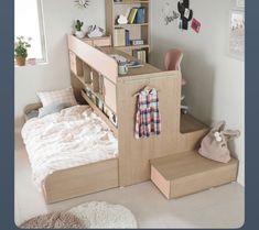 a bedroom with a bed, desk and book shelf