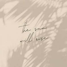 the sun will rise written in cursive handwriting on a white background with palm leaves