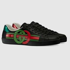 Gucci Men's Ace Sneakers With Signature Branded Interlocking G's Detail Chromatic Contrast Playfully Modernizes The Traditional Athleisure Sneaker With Interlocking Gg And Athletic Stripes As Part Of The Epilogue Collection. A Nod To The Founder Of The House. The Fashion House's Signature Green And Red Color Combo Recalls Heritage Themes Set Against An All-Black Silhouette. A Solid Rubber Heel Makes This Low-Top A Lasting Wardrobe Addition. Condition: Brand New Item; Never Worn Details: Contrast Gucci Slip On Sneakers, Red Color Combo, Gucci High Top Sneakers, Gucci High Tops, Beige Sneakers, Athleisure Sneakers, Gucci Sneakers, Tan Shoes, Black Silhouette