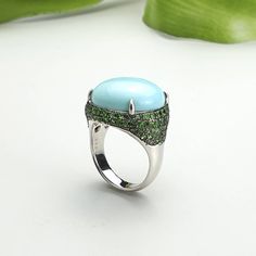 🌱Handmade 14K Turquoise ( 2.83 gram ) ring 🌱14K 585 gold and Natural Tsavorite (110 pcs) 🌱Authentic Korean jewelry 🌱Free standard shipping from Seoul, Korea with tracking 🌱Will take approximately 7-21 days to arrive, worldwide NASCHENKA is an artistic expression of Korean culture and history through traditional jewelry. We use natural and authentic stones. Each piece is thoughtfully designed by a designer and handmade by a highly skilled master artisan. Size Guide * The approximate size and Elegant Oval Cabochon Turquoise Ring For Anniversary, Fine Jewelry Hallmarked Turquoise Ring As Gift, Hallmarked Turquoise Ring In Fine Jewelry Style For Gift, Handmade Turquoise Ring For Anniversary, Handmade Fine Jewelry Turquoise Anniversary Ring, Fine Jewelry Hallmarked Turquoise Ring For Gift, Luxury Round Turquoise Ring For Gift, Luxury Turquoise Ring As A Gift, Luxury Turquoise Ring As Gift