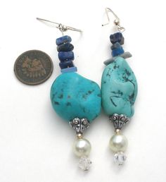 Hand Made Statement Jewelry - This is a substantial pair of silver dangle drop pierced earrings with large turquoise nuggets, blue sodalite, faux pearls and aurora borealis crystal beads. They 3.25" long and are slightly over .75" wide and weigh 25.6 grams. Sterling Silver Blue Jewelry With Pearl Drop, Adjustable Blue Pearl Drop Jewelry, Blue Pearl Drop Bohemian Earrings, Blue Bohemian Pearl Drop Earrings, Bohemian Blue Gemstone Earrings, Aurora Borealis Crystal, Blue Sodalite, Vintage Turquoise, Earrings Vintage