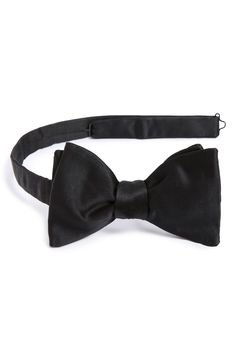 Lustrous silk lends handsome style to a classic bow tie. Style Name:Eton Silk Bow Tie. Style Number: 5060153. Available in stores. Pre-tied Satin Bow For Black Tie Events, Classic Pre-tied Satin Bow Tie, Classic Black Satin Bow Tie, Classic Black Bow Tie With Detachable Bow, Classic Bow Tie For Black-tie Events, Tuxedo Bow Tie With Satin Bow For Black-tie Events, Classic Adjustable Bow Tie For Black-tie Events, Tuxedo Suit And Tie Accessories For Black-tie Events, Detachable Bow For Black-tie Events