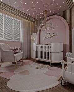 a baby's room is decorated in pink and gold