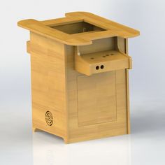 a small wooden box with an open lid and door on the inside, sitting on a white surface