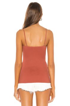 Copper Cami Top with Front Ring Accent: This stunning Free People Be My Baby Cami in copper features a unique front ring accent that adds a touch of personality and style.Adjustable Shoulder Straps and Stretch Fabric: The adjustable shoulder straps and stretch fabric ensure a comfortable and flattering fit for all body types.Versatile and Easy to Style: This cami can be dressed up or down, depending on the occasion. Pair it with jeans and sandals for a casual look, or with a skirt and heels for Jeans And Sandals, Skirt And Heels, Be My Baby, Formal Looks, All Body Types, Cami Top, A Skirt, Tops For Women, Cami Tops