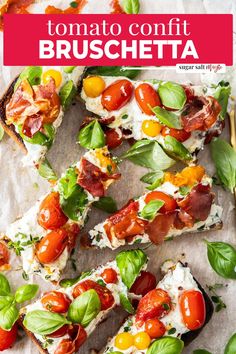 a pizza with tomatoes, mozzarella cheese and basil leaves on top is shown