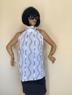 "This is a very stylish Woman cotton blouse. It is comfortable and cozy. Made for a free flowing fit. Great for all year around and for any special occasion or casual day can be dressed up or dressed down. SIZE CHART SIZE S - US 6, UK 8, EU 36 bust: bust around 34.5\"/90cm Waist: waist around 27.5\"/70cm Hips: hips around 34.5\"/90cm SIZE M - US 8, UK 10, EU 38 bust: bust around 37.5\"/95cm Waist: waist around 29.5\"/75cm Hips: hips around 37.5\"/95cm SIZE L - US 10, UK 12, EU 40 bust: bust arou Casual Embroidered Top For Summer Daywear, Chic Embroidered Cotton Tops, Spring Sleeveless Cotton Blouse, Chic White Embroidered Blouse, Elegant White Cotton Tank Top, Elegant Cotton Vacation Tops, White Sleeveless Embroidered Top For Beach, Elegant Cotton Tops For Vacation, White Cotton Embroidered Top For Daywear