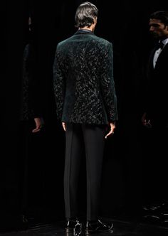 This metallic wildflower embellished tuxedo is a concept piece. Single-buttoned satin detail shawl collar with adorned edges. The tuxedo is immaculately paired with black flat-front trousers. Embroidery Details: Embroidered With Metallic Sequins, Cut Beads And Crystals. Luxury Outerwear With Shawl Collar For Parties, Designer Evening Suits For Fall, Luxury Suits With Notch Lapel For Night Out, Elegant Sequined Suits For Evening, Black Silk Tuxedo For Party, Black Shawl Collar Party Blazer, Elegant Fitted Tuxedo For Holidays, Black Shawl Collar Blazer For Party, Elegant Sequined Blazer For Formal Occasions