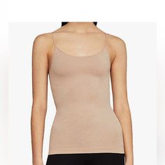 Super Cute! Perfect For Hot Summer Days! I Have At Least 4 Of These. Fitted Beige Tops With Built-in Bra, Beige Seamless Stretch Camisole, Beige Stretch Seamless Camisole, Stretch Seamless Camisole, Shaping Seamless Camisole, Fitted Tank Camisole For Layering, Beige Stretch Top With Built-in Bra, Fitted Tank Camisole With Built-in Bra, Elegant Sleeveless Seamless Camisole