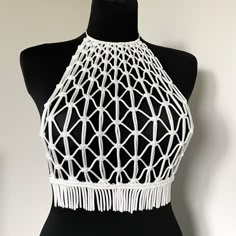 Macrame Handmade Top - a white masterpiece designed for parties, beach celebrations, vacations, and festival looks. This versatile top is your ideal choice for making a statement at any festive occasion, providing the perfect blend of style and comfort. Elevate your wardrobe with this must-have piece, also perfect as a festival white top for those special moments. Information: * Material: polyester cord. * Color: white - ready to ship.  * Size: s-m size * Handmade by myself in Lithuania, Europe. White Crochet Beachwear Top, White Beachy Crochet Top For Vacation, White Bohemian Crochet Top For Party, White Crochet Top For Beach Party In Spring, Fitted Crop Top For Summer Beach Party, White Crochet Top For Spring Beach Party, Beach Season Party Crochet Top, White Crochet Top For Beach Party, White Sleeveless Crop Top For Beach Season