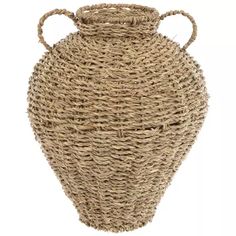 a large vase made out of straw with handles on the top and bottom, sitting in front of a white background