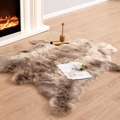 PRICES MAY VARY. Material: Made with high quality faux fur, 2.4-Inch-thick pile provides the fluffy touch and soft feeling. Size: Approx. 4 ft x 5 ft in reindeer skin shape, perfect size for home area rug add style to any room. Multi-use: Faux reindeer hide/skin fur item used as seat cushion over your armchair and sofa, throw rug for living room and bedroom floor. Gorgeous accent: Fluffy faux reindeer hide fur with soft ivory suede backing looks like brushed leather. Give your home a touch of lu Faux Fur Rug Bedroom, Fur Rug Bedroom, Reindeer Hide, Rug Fluffy, Corner Lights, Fur Rugs, Faux Fur Area Rug, Hunting Room, Fur Carpet