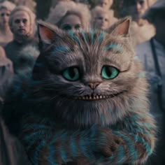 a cat with blue eyes is surrounded by people