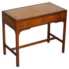 a wooden desk with two drawers on one side and an open drawer on the other