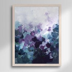 an abstract painting with blue and purple flowers in the foreground, on a white wall