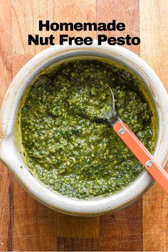 homemade nut free pesto in a bowl with a spoon