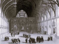 this is an old photo of people in a large building with many windows and arches