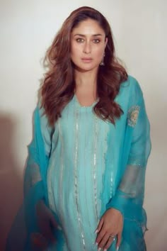 Turquoise blue chanderi kurta with zari and sequins detailing and sleeves are highlighted with sequins and embroidered organza details. Paired with shantoon palazzo with zari lace details and embroidered scallop organza dupatta. Kurta Palazzo Set, Pakistani Designer Suits, Kurta Set For Women, Red Lehenga, A Line Kurta, Palazzo Set, Kareena Kapoor Khan, Embroidery Suits Design, Suits Design