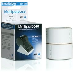 a white box with a black adhesiver on it next to an empty roll of tape