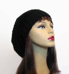 This hat is made to order. This beanie is slouchy. I crocheted it with black acrylic yarn. It is stretchy and will fit most teens or adults, men or women. It will fit anywhere on your head and has a large enough slouch to tuck lots of hair. It is very simple but classy. Hand wash is recommended. Please choose your size from the drop down menu. One Size Brimmed Acrylic Beanie, Black Knitted Cap, Black Fall Hats One Size, Black Hats For Fall, One Size Black Hat For Fall, Casual Black Brimmed Beret, Black Acrylic Hat, One Size Fits Most, Black Acrylic Hat One Size Fits Most, Adjustable Black Crochet Hat For Winter