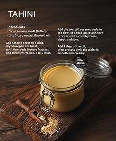 the ingredients for tahni are displayed on a wooden tray