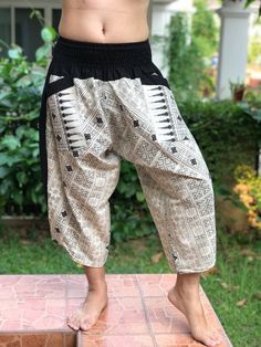 "XL Size - Samurai Pants (Unisex) Elastic Waist MATERIAL: 100% Cotton APPROX MEASUREMENT: Waist: 28\"- 48\" Length: 29\" Around Ankle: 20 inch Category: harem pants, Japanese, ninja pants, pants, samurai, samurai pants, samurai-pants-elastic-waist, thai pants Shipping & Handling * Parcels will be ship via DHL Express FEATURE: Handmade Ethically, Breathable, Unisex, Comfortable to Wear & Stylish. SIZE: One size fits most, elastic waist (see measurement) GENDER: M/F ❤️ PAYMENT We accept pa Traditional Harem Pants For Yoga, Traditional Harem Yoga Pants, Traditional Harem Bottoms With Pockets, Traditional Wide Leg Harem Pants For Yoga, Traditional Harem Pants For Yoga With Pockets, Traditional Yoga Harem Pants With Pockets, Traditional Pants With Pockets For Festival, Traditional Festival Pants With Pockets, Traditional Wide Leg Parachute Pants For Festivals