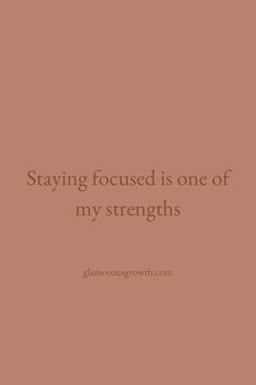 a brown background with the words staying focused is one of my strengths on it