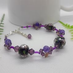 Handmade By Me This Elegant Bracelet Makes A Great Gift For Yourself Or For Anyone . Perfect For Work, Wedding, Every Day Fashion Or For Any Occasion. Material:Silver Wire Lead Free, Nickel Free, Cadmium Free And Hypoallergenic That Won’t Irritate Sensitive Skin 6mm Amethyst Swarovski, 8mm Crackle Beads, 12mm Purple Glass Beads Size: 7" + 2"Extender Chain Can Customize To Fit Your Size Upon Request Add Charms $1 Each From # 1-23, Or $1.50 For #24, #25, #26 Buy 1 For $25, Or 2 For $40 Elegant Bracelet, Purple Glass, Silver Wire, Womens Jewelry Bracelets, Bracelet Making, Glass Beads, Shades, Jewelry Bracelets, Amethyst