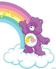 a purple teddy bear sitting on top of a rainbow