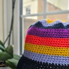 Let's say hello to this colourful bucket hat. Definitely able wearable anytime and at all times as you choose. Handmade of 100% Acrylic yarn that appears summer-rryy but is also suitable for a cold day. Let it with your everyday OOTD or we can have it wrapped as a gift too. Dimensions: Length (Top of hat to end of brim) : 9 1/2 in or 24.1cm Adult size of 20-22 in head circumference Everyday Ootd, African Hats, Handmade Hats, Handmade Hat, Bucket Hats, Skull Cap, Head Circumference, Cold Day, Acrylic Yarn