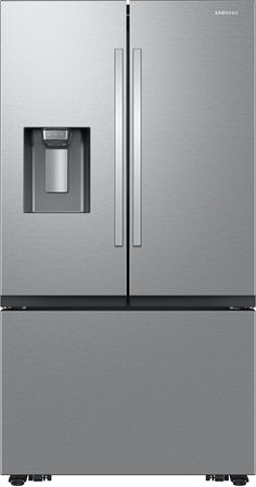 a stainless steel refrigerator freezer with water dispenser and ice maker on the door