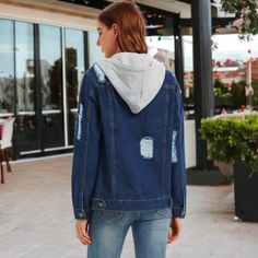 Elevate your outerwear game with the Anna-Kaci Women's Detachable Hoodie Denim Distressed Jean Jacket, available in three stylish color options: black, blue, and indigo. This versatile jacket features a detachable hoodie for customizable styling and is sure to become your go-to choice for any outing. Trendy Ripped Winter Outerwear, Trendy Hooded Denim Jacket In Blue, Urban Ripped Cotton Outerwear, Trendy Fall Denim Jacket For Outdoor, Trendy Fall Outdoor Denim Jacket, Trendy Hooded Outerwear In Medium Wash, Hooded Denim Outdoor Jacket, Hooded Dark Wash Denim Jacket For Fall, Trendy Medium Wash Hooded Outerwear