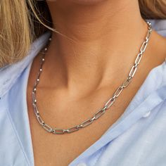 PRODUCT DETAILS Water resistant 💧 Brass White Rhodium Gold Filled Chain Hypoallergenic Nickel Free Size:16'' in length + 3" Extender - 5mm width. DESIGNER NOTE A minimalist masterpiece that blends contemporary design with timeless elegance. STYLE TIP: Elevate your everyday look by pairing this chain with other delicate chains of varying lengths, allowing you to achieve a trendy and personalized layering style. Modern Metal Chain Necklace With Oval Link, Modern Oval Link Chain Necklace With Adjustable Chain, Modern Silver Chain Necklace With Link, Modern Silver Chain Link Necklace, Modern Snake Chain Necklace For Everyday, Modern Everyday Snake Chain Necklace, Modern Silver Cable Chain Necklace, Modern White Gold Snake Chain Necklace, Modern Chain Necklace With Rectangular Links