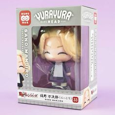 an action figure is in a box on a purple background with the words yarjura head above it